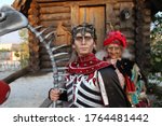 Small photo of Sochi, Russia - JUNE 06, 2020: Animators at the amusement park. Actor. Baba yaga and Koshchei the deathless. Mimes. Makeup. Sochi Park.