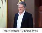 Small photo of LOS ANGELES - DEC 9: Hugh Grant at the Wonka Los Angeles Premiere at the Village Theater on December 9, 2023 in Westwood, CA