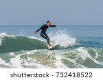 Surfer In Action With A Small...