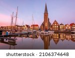 View on St. Michaels church in the city Harlingen in Friesland the Netherlands at sunset