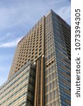 Small photo of TOKYO, JAPAN - DECEMBER 1, 2016: Konami headquarters in Tokyo Midtown complex. Konami is a major toy and video game company founded in 1969. It employs 5,400 people.