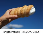 Schaumrolle Austrian sweet food. Tube pastry filled with meringue cream. Austrian cuisine.