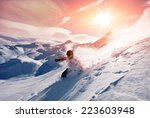 Young man skiing in powder snow