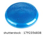 Small photo of Blue inflatable balance disk isoleated on white background, It is also known as a stability disc, wobble disc, and balance cushion.