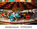 Girl Riding Blue Dragon Carousel