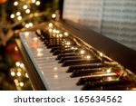 A Piano With Christmas Lights...