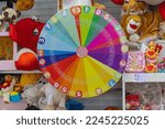 Colourful Spinning Wheel of Fortune Spinner Target Game at Fun Fair