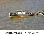 Tugboat In The River Thames...