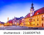 Maribor, Slovenia. Twilight colored Main Square with Plague Column, slovene travel spotlight.