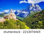 Colle Santa Lucia, Italy. Beautiful famous landscape with Chiesa di Colle Santa Lucia and Mount Pelmo. Belluno region, South Tyrol - Dolomites Mountains.