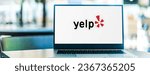Small photo of POZNAN, POL - JAN 6, 2021: Laptop computer displaying logo of Yelp, an American public company headquartered in San Francisco, California