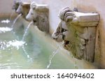 Water Flow From Lion Statue On...