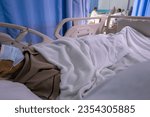Small photo of Patient is bedridden in hospital room. Health care medical concept.