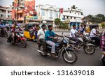 Small photo of THANJAVUR, INDIA - FEBRUARY 13: Indian riders ride motorbikes on busy road on February 13, 2010 in Thanjavur, India. Motorbike is the most favorite vehicle and most affordable for India.