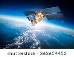 Space satellite orbiting the...