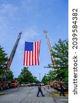 Small photo of CUMMING, GEORGIA - September 10, 2021: A memorial service commemorating the 20th anniversary of the terrorist attacks on nine-eleven is held in Fowler Park in Cumming, Georgia.