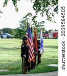 Small photo of CUMMING, GEORGIA - September 10, 2021: A memorial service commemorating the 20th anniversary of the terrorist attacks on nine-eleven is held in Fowler Park in Cumming, Georgia.