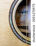 Small photo of CUMMING, GEORGIA - September 7, 2021: Taylor Guitars is an American guitar manufacturer specializing in acoustic guitars and is one of the largest manufacturers of acoustic guitars in the United