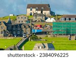 Small photo of LERWICK, SCOTLAND - September 5, 2023: Lerwick is the main town and port of the Shetland archipelago, Scotland. Lerwick has 7,000 residents, but 2 cruise ships easily doubles the population.