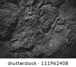 surface of the cave rock wall. gray stone texture background.