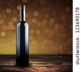 Wine Bottle On Wood Floor With...