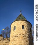 Small photo of Bebenhausen, Tubingen, Germany - February 24, 2020: Tower in the Bebenhausen Monastery and Palace, best-preserved Cistercian abbey in Southern Germany. Regional flag is visible