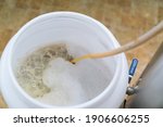 the process of home brewing... | Shutterstock . vector #1906606255