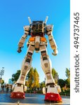 Small photo of Full size Gundam Performances Outside DiverCity Tokyo Plaza, Odaiba, Tokyo, Japan - 27 November 2015: It is 18m tall The sculpture of famous anime franchise robot, Gundam.