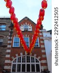 Small photo of Chinatown, London UK - 04 21 2023: Lanterns over Gerrard Street.