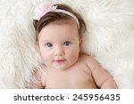 Newborn Baby Girl Posed In A...