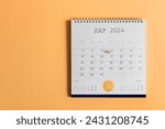 July 2024 desk calendar with marked date 4th of July Usa flag. United States Independence day celebration concept