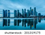 The Singapore Skyline At Dawn.