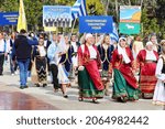 Small photo of MARIUPOL, UKRAINE-SEPT 25: Defile participants of Greek community Ethnic Festival Mega Yorty in Greek National costume September 25, 2021 in Mariupol,Ukraine