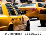 Yellow cab speeds through Times Square in New York, NY, USA. 
