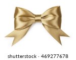 Gold bow isolated on white background.