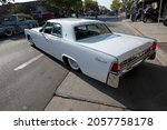 Small photo of BAKERSFIELD,CA - OCTOBER 9, 2021: The long, low and wide design is personified by this 1963 Lincoln Continental on display today at the Cruisin 4 Charity car show.