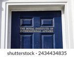 Small photo of London, UK - February 19th 2024: The sign on the entrance to Chatham House which is home to The Royal Institute of International Affairs, located on St. James's Square in London, UK.