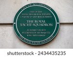 Small photo of London, UK - February 19th 2024: A plaque on St. James's Street in London, UK, marking the location of the Thatched House Tavern where the Royal Yacht Squadron was formed in 1815.