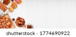 Small photo of Selection of take out and fast foods. Corner border banner. Pizza, hamburgers, fried chicken and sides. Top down view on a white wood background with copy space.