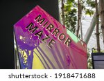 Small photo of Singapore - Dec 31, 2020: Mirror Maze sign at Jewel Changi Singapore. Mirror maze creates a space of disorientation for visitors.