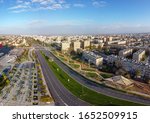 Aerial view on the Beer-Sheva street with crossroad, mall, fountain and palm grove