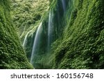 Waterfall In The Deep Forest On ...