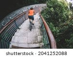 Woman riding down stairs. Sports extreme and active lifestyle
