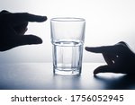 Hands measure on glass that has ...