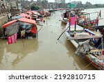 Small photo of SUKKUR, PAKISTAN - AUG 22: View of stagnant water after low-level flood at Indus River while flood water entered riverside settlements, showing negligence of authorities, on August 22, 2022 in Sukkur.