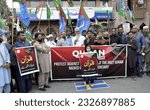 Small photo of HYDERABAD, PAKISTAN - JUL 04: Activists of Jamat-e-Islami (JI) are holding protest demonstration against desecration of Holy Quran in Sweden, at Hyder Chowk on July 4, 2023 in Hyderabad.