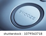 Close up shot of a snooze button of an electronic clock.