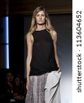 Small photo of NEW YORK - SEPTEMBER 11: Model walks the runway for Nomia Collection by Yara Flinn during Spring/Summer 2013 at Mercedes-Benz Fashion Week at Standard Hotel on September 11, 2012 in New York