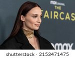 Small photo of New York, NY - May 3, 2022: Sophie Turner wearing dress by Louis Vuitton attends 'The Staircase' TV show premiere at MoMA