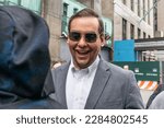 Small photo of Congressman George Santos attends pro-Trump supporters rally at New York criminal court on April 4, 2023 during appearance by Former President Donald Trump Jr.